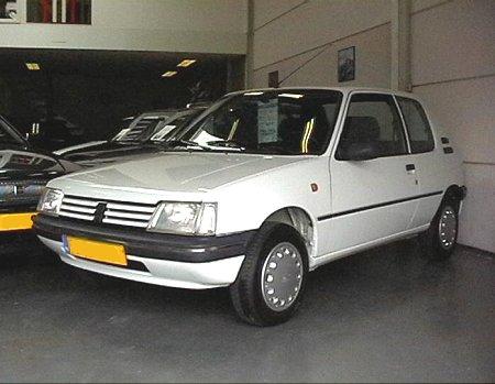 Peugeot 205 Diesel 19 litres pulled my dads BMW 325i at 70 mph